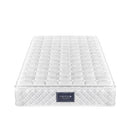 White mattress with a brand label on a white background