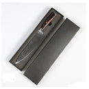 Kitchen knife with protective sheath on light background.
