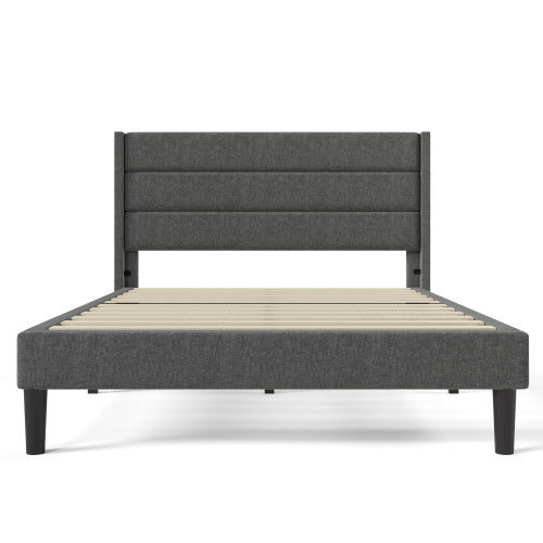 Gray upholstered bed frame with wooden slats on a white background