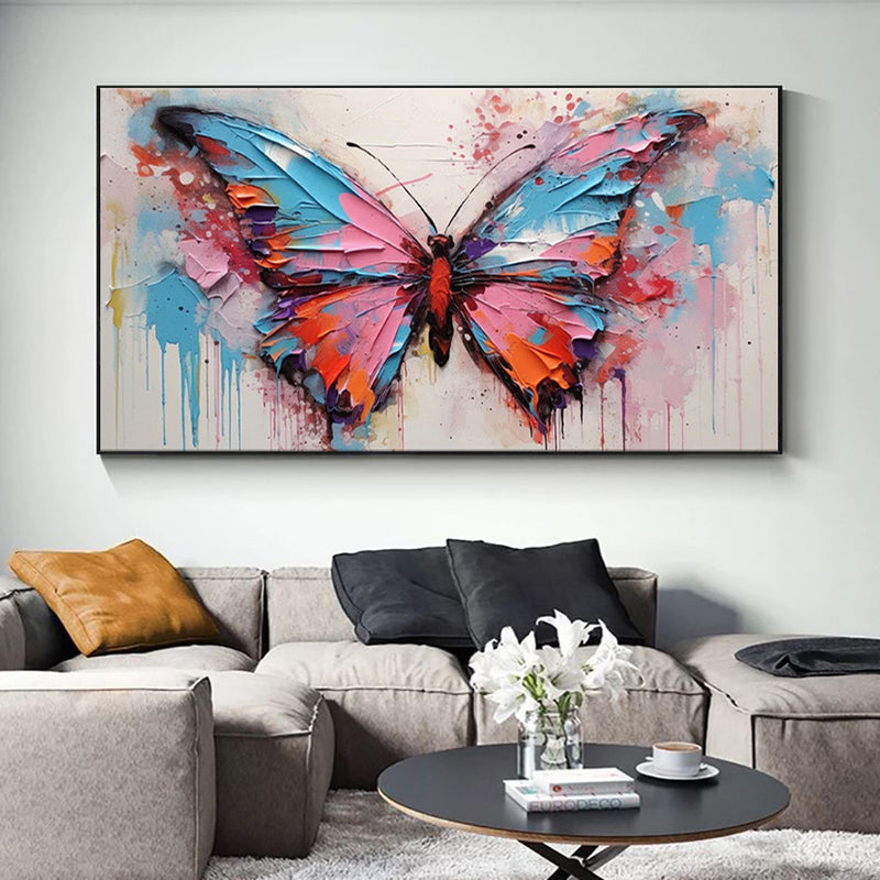 Colorful butterfly painting on a wall above a living room sofa.