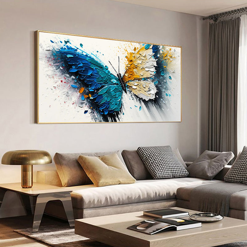 Living room with a large abstract butterfly painting on the wall