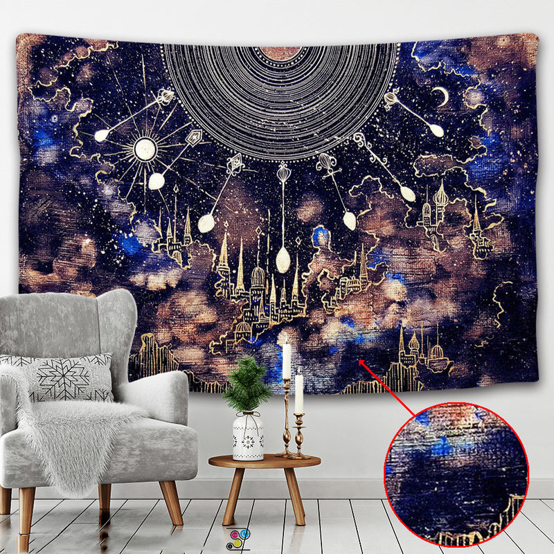 Decorative tapestry with celestial design in a room with a chair and small table.
