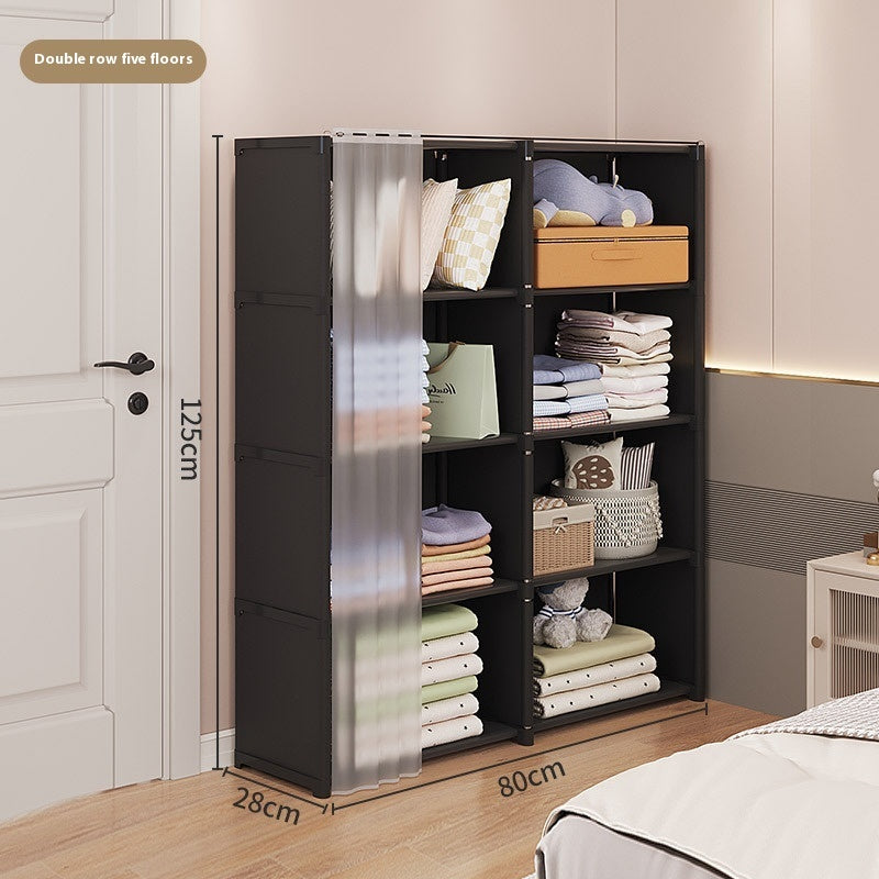Black storage cabinet with shelves filled with folded clothes and pillows in a room.