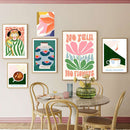 Home decor, room decor, wall decor, Dining room with colourful wall art and a marble table.