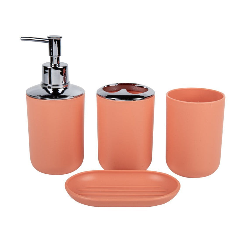 Household supplies, household cleaning products, cleaning products Set of four peach-coloured bathroom accessories with a silver pump on a white background
