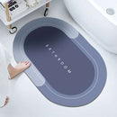 Mat, comforters, Grey bathmat with 'Bathroom' text on a bathtub