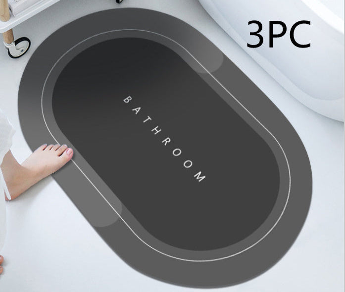 Mat, comforters, grey bathmat with 'Bathroom' text on a white background