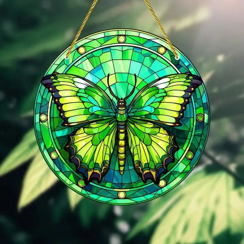 Home decor, room decor, wall decor, Stained glass butterfly artwork with a green and blue colour scheme, hanging against a natural background.