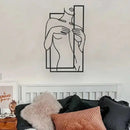 Home decor, room decor, wall decor, Decorative wall art of a stylized figure holding a mirror above a bed with pillows.