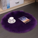 Mats, bed sheets, comforters, Purple fluffy rug with a cup, saucer, and book on a dark floor.