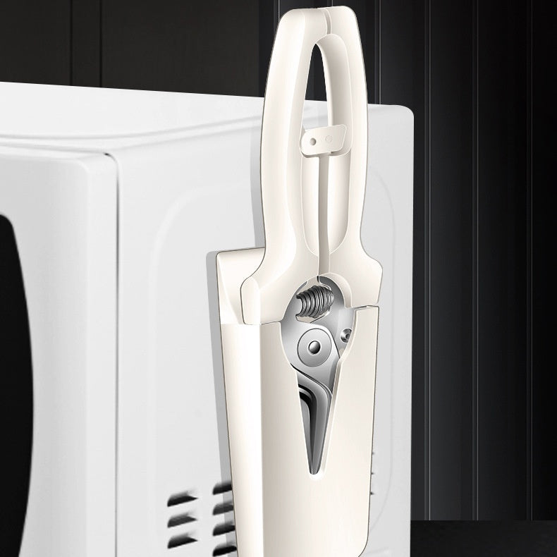 Household supplies, household cleaning products, cleaning products White bottle opener attached to a white appliance with a black background