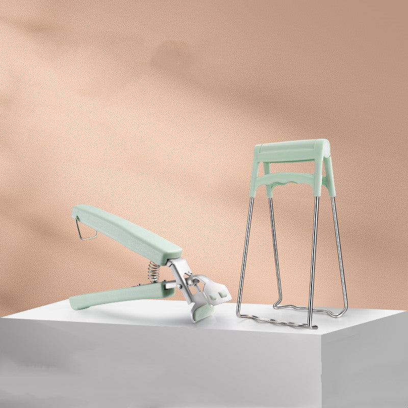 Household supplies, household cleaning products, cleaning products Light green kitchen tool and stool on a white platform with a beige background