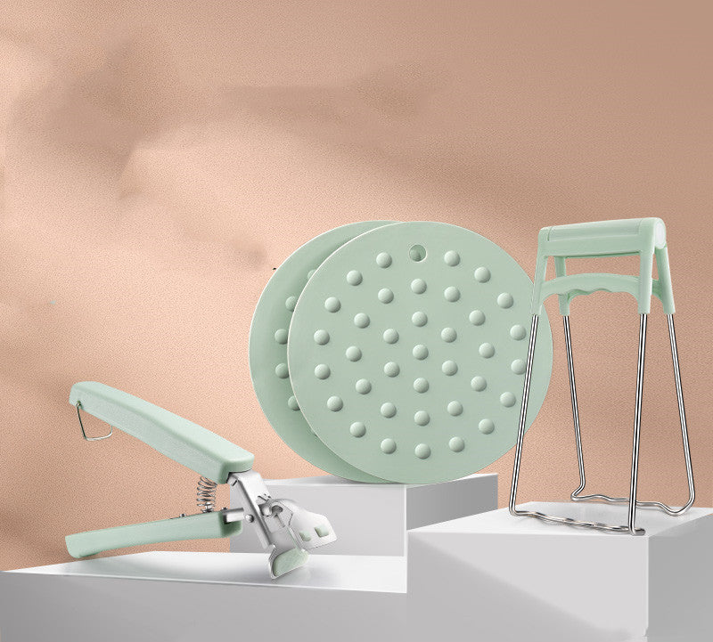 Household supplies, household cleaning products, cleaning products Light green shower head and handheld shower on a beige background