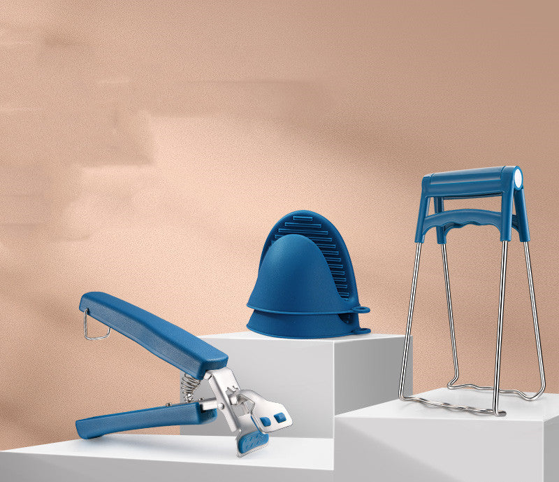 Household supplies, household cleaning products, cleaning products Set of blue kitchen tools including a whisk, spatula, and stand mixer on a beige background