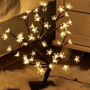 Home, decor, room decor, Decorative LED tree with lights on a bed