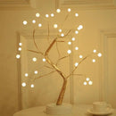 Home decor, room decor, Decorative LED tree with lights on a neutral background