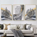 Home decor, wall decor, room decor, Three framed pieces of abstract art with Arabic calligraphy on a wall above a sofa.