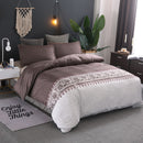 Mat, bed sheets, comforters, Bedroom with brown bedding, decorative pillows, and a plant on a grey wall.