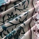 Mat, bed sheets, comforters, Close-up of patterned fabric with green and brown designs on a white background