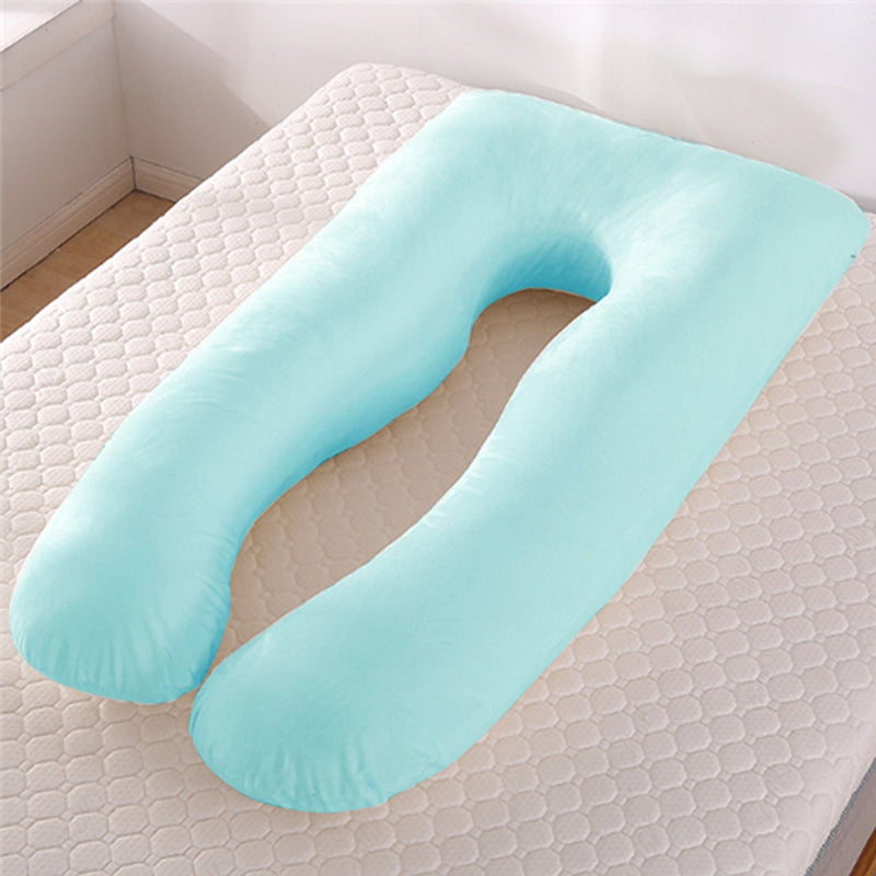 Comforters, bed sheets, mats, Light blue U-shaped body pillow on a textured surface