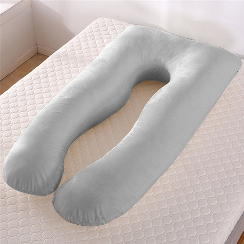 Comforters, bed sheets, mats, Gray U-shaped body pillow on a mattress