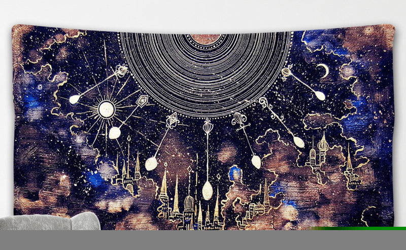 Decorative tapestry with celestial design featuring stars, planets, and cityscape on a dark background.